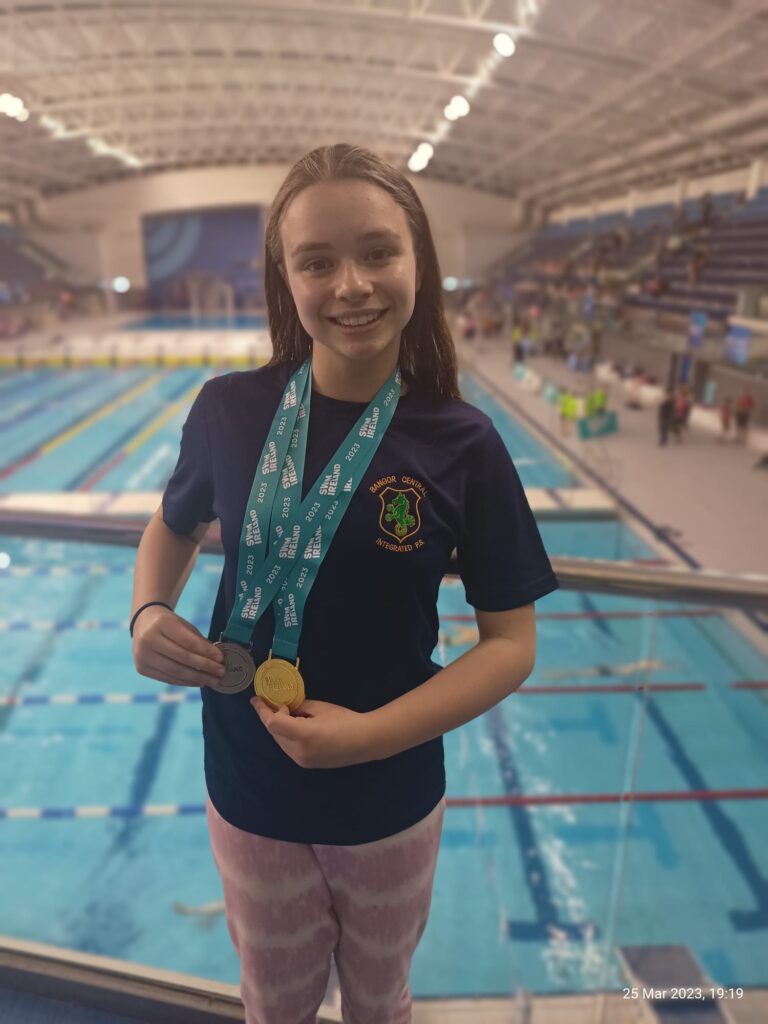 mila pickett with her 50m butterfly championship medals