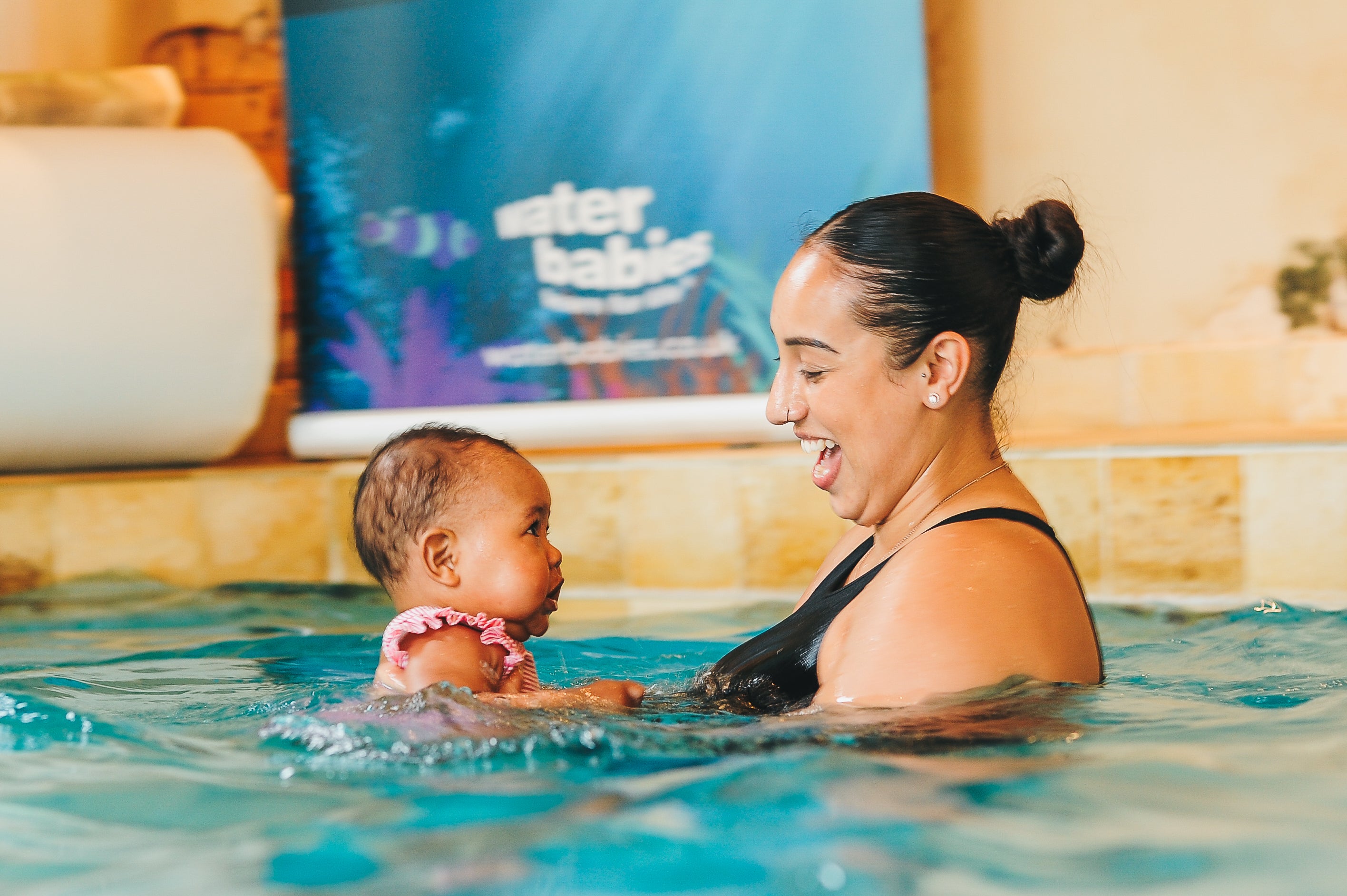 baby and mum in a water babies lesson