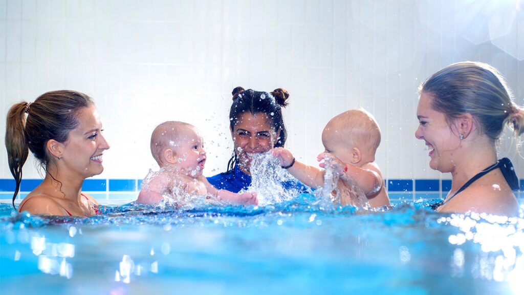 water babies teacher with parents and babies