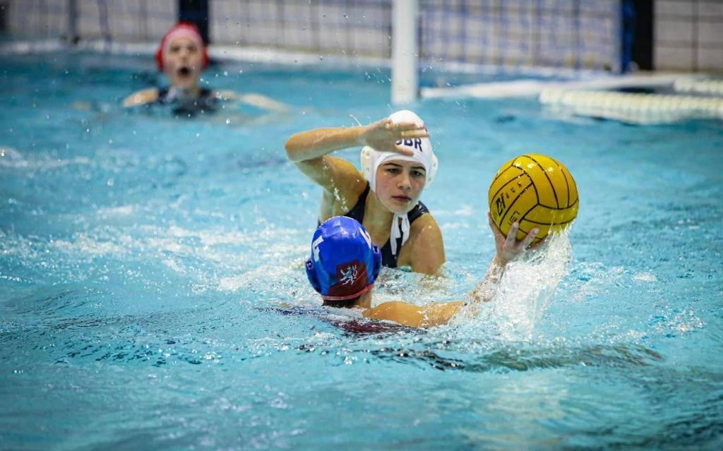 water babies swimmer amelia playing water polo