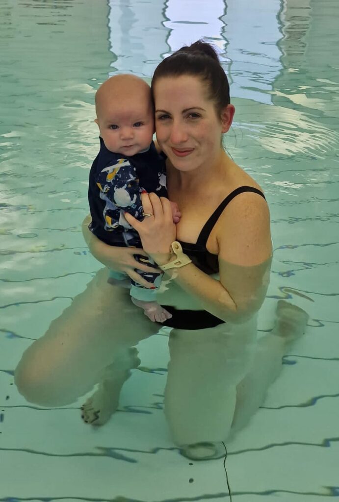 mum kelly and son orson in water babies lesson