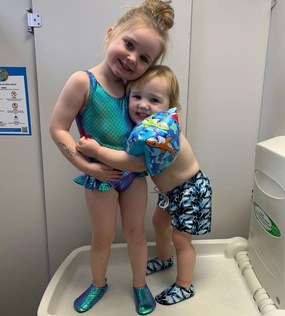 brother and sister at water babies lesson
