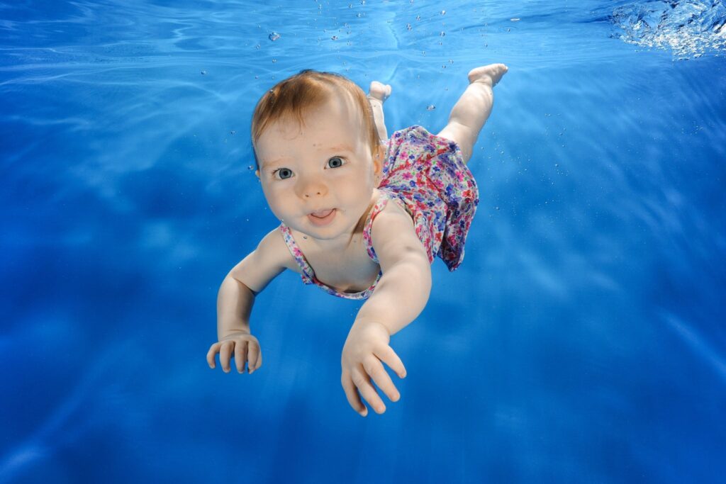 baby swimming underwater