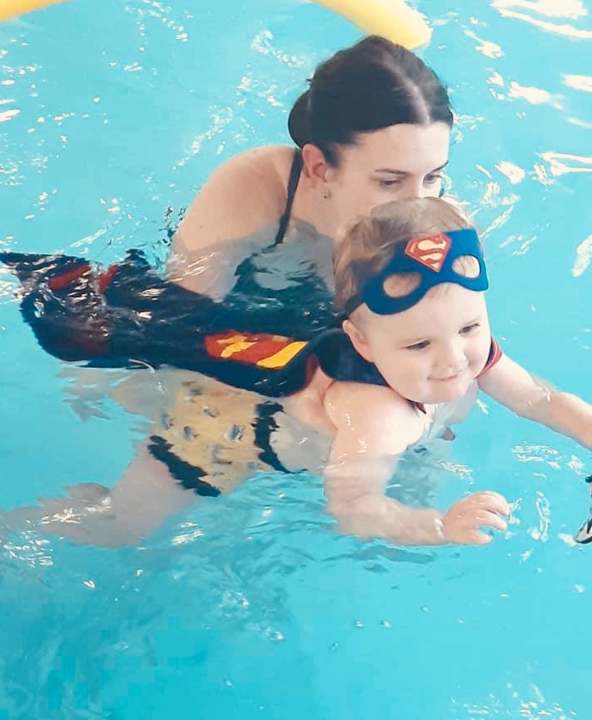 water babies swimmer dressed as a superhero