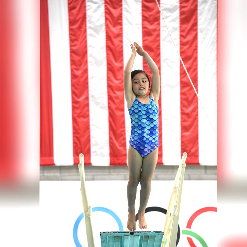 water-babies-graduate-diving-in-from-diving-board