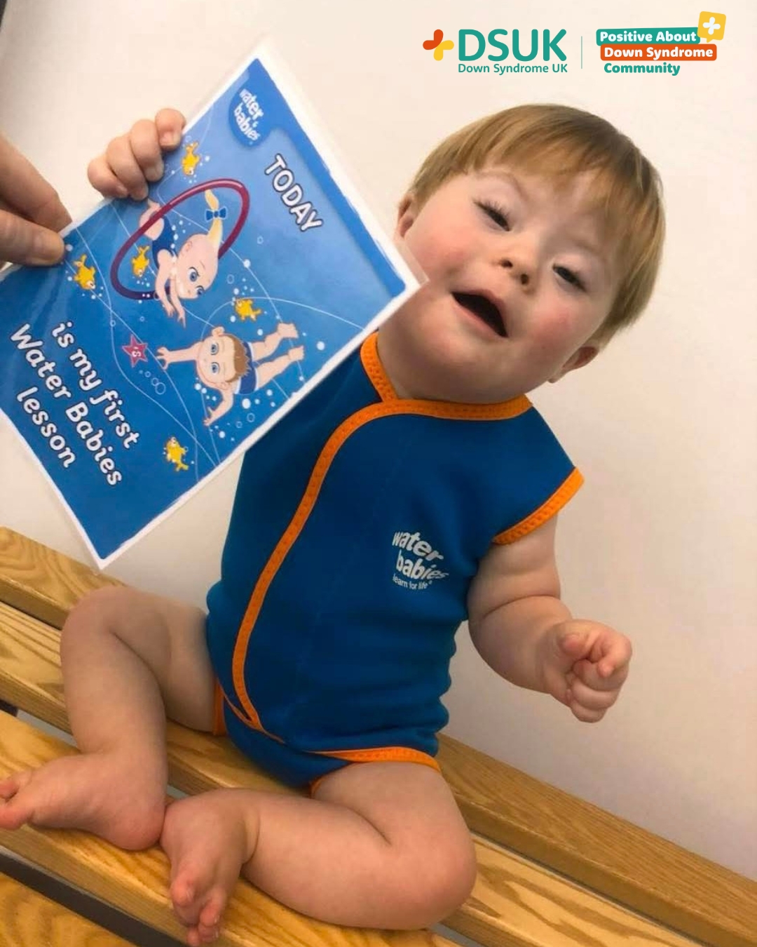 baby with down syndrome in water babies swimming clothes