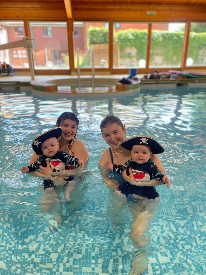 water babies parents in swimming lesson during splashathon