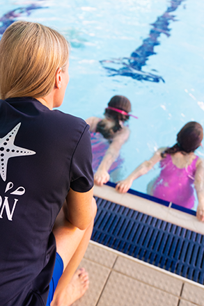 water babies swimvincible teacher with two students