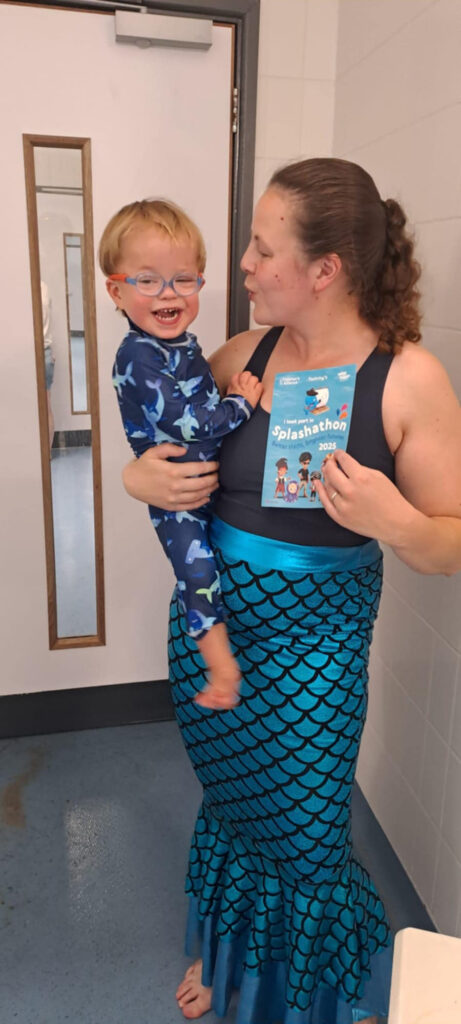 charlie risby and mum amber in water babies swimming lesson